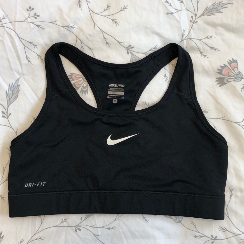 Nike Dri-Fit black sports bra. Very supportive.